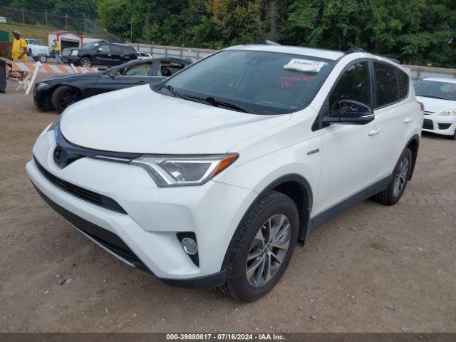 JTMRJREV8JD204083 Toyota Rav4 Hybrid Xle