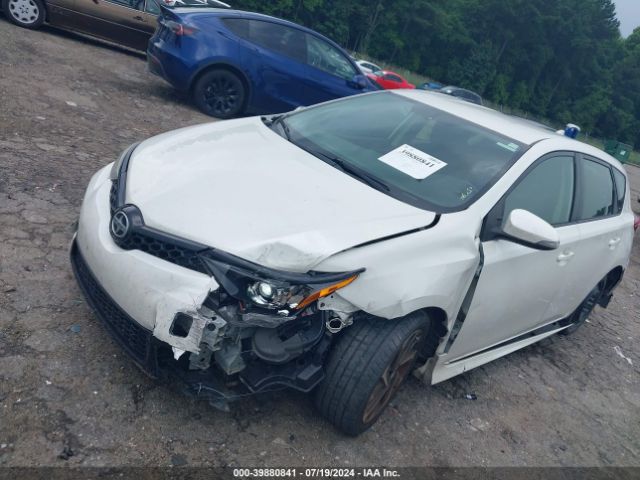 JTNKARJE4GJ513014 Scion IM