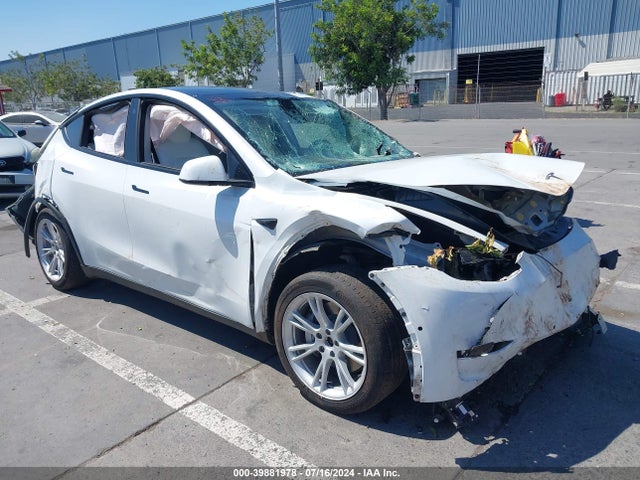 2021 TESLA MODEL Y 5YJYGAEEXMF197663 Photo 0