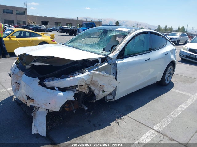 2021 TESLA MODEL Y 5YJYGAEEXMF197663 Photo 1