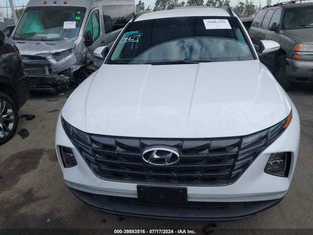 KM8JBCA1XPU118885 Hyundai Tucson Hybrid Blue