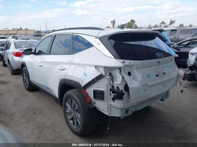 KM8JBCA1XPU118885 Hyundai Tucson Hybrid Blue
