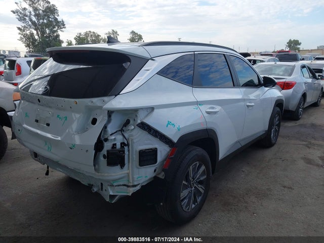 KM8JBCA1XPU118885 Hyundai Tucson Hybrid Blue
