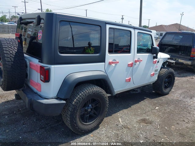 1C4BJWDG5GL134351 Jeep Wrangler Unlimited Sport