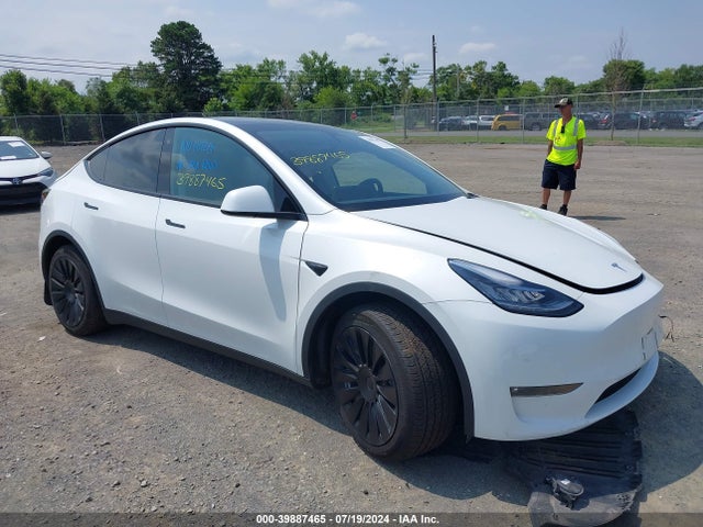 2023 TESLA MODEL Y 7SAYGDEE1PF611177 Photo 0