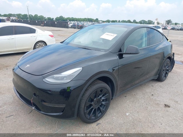 2024 TESLA MODEL Y 7SAYGDED8RF022380 Photo 1