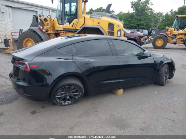 5YJ3E1EAXMF911322 Tesla Model 3 Standard Range Plus Rear-wheel Drive