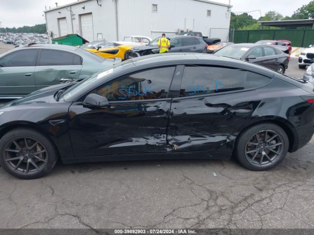 5YJ3E1EAXMF911322 Tesla Model 3 Standard Range Plus Rear-wheel Drive