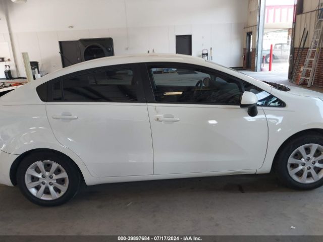 KNADM4A3XE6395294 KIA RIO LX
