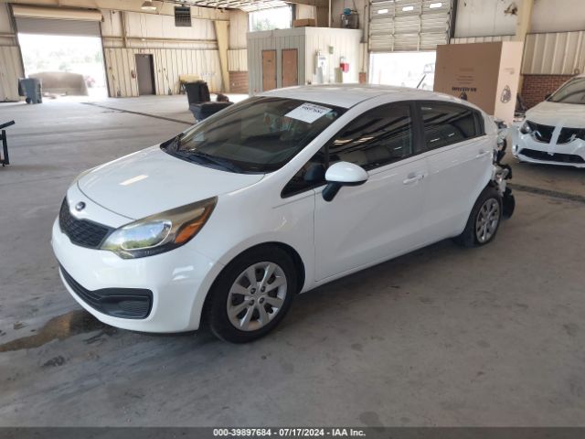 KNADM4A3XE6395294 KIA RIO LX