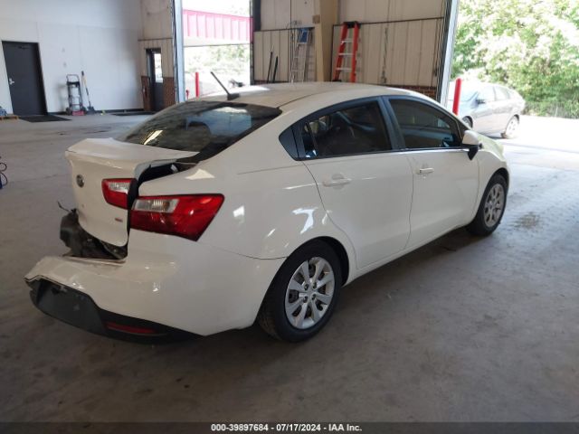 KNADM4A3XE6395294 KIA RIO LX