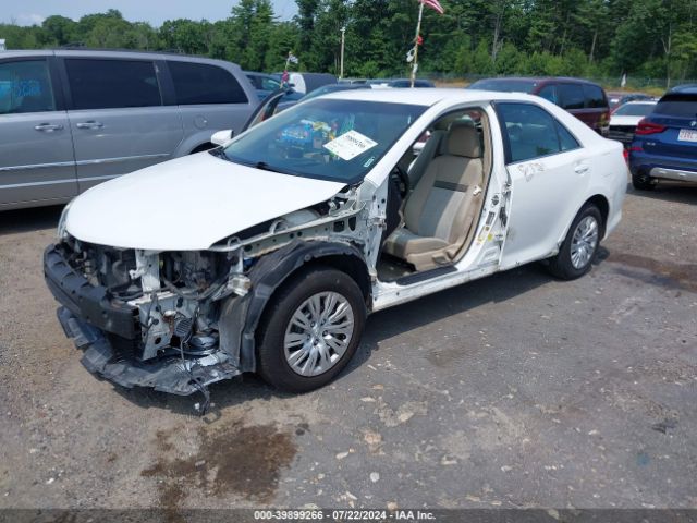 4T1BD1FK5EU099146 Toyota Camry Hybrid Le