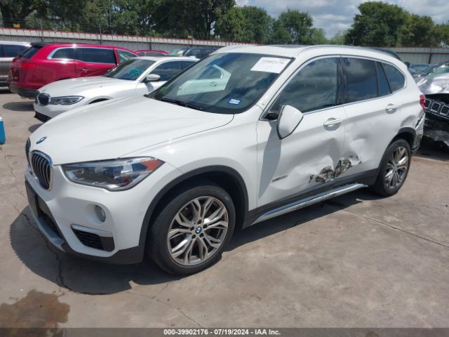 2017 BMW X1 WBXHT3C33H5F87302 Photo 1
