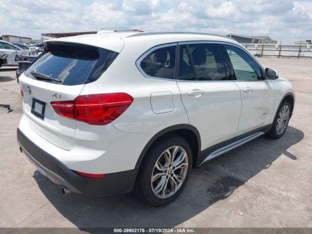 2017 BMW X1 WBXHT3C33H5F87302 Photo 3