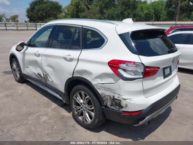 2017 BMW X1 WBXHT3C33H5F87302 Photo 5