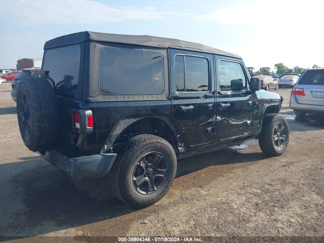 1C4HJXDG9JW165110 Jeep Wrangler Unlimited Sport S 4x4