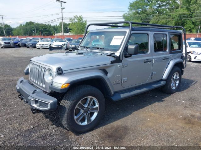 1C4HJXEG9JW101941 Jeep Wrangler Unlimited Sahara