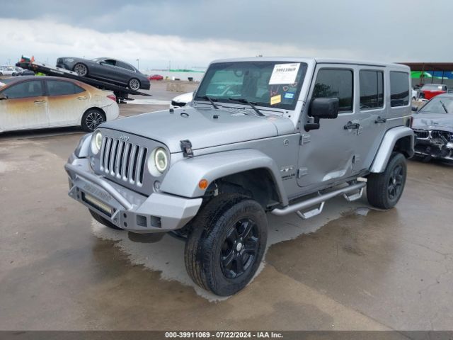 1C4BJWEGXGL323303 Jeep Wrangler Unlimited Sahara