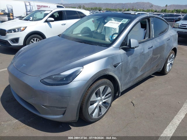 2024 TESLA MODEL Y 7SAYGDEE6RA290270 Photo 1