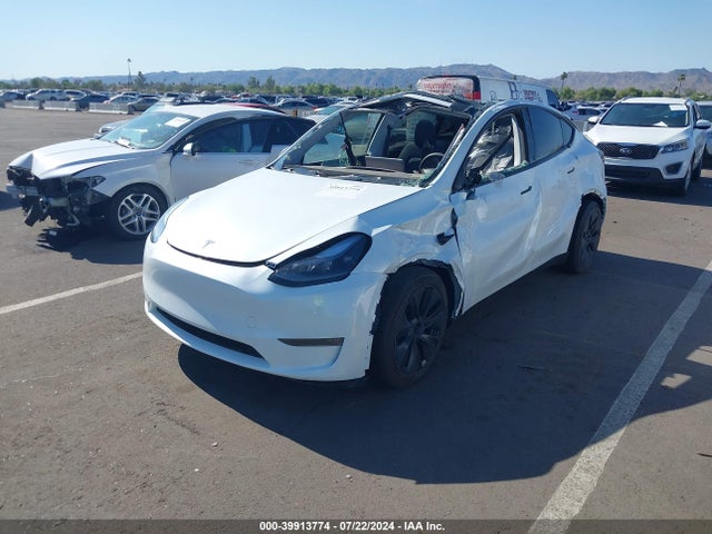 2024 TESLA MODEL Y 7SAYGDEE1RA290824 Photo 1