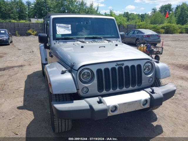1C4BJWEG9FL704333 Jeep Wrangler Unlimited Sahara