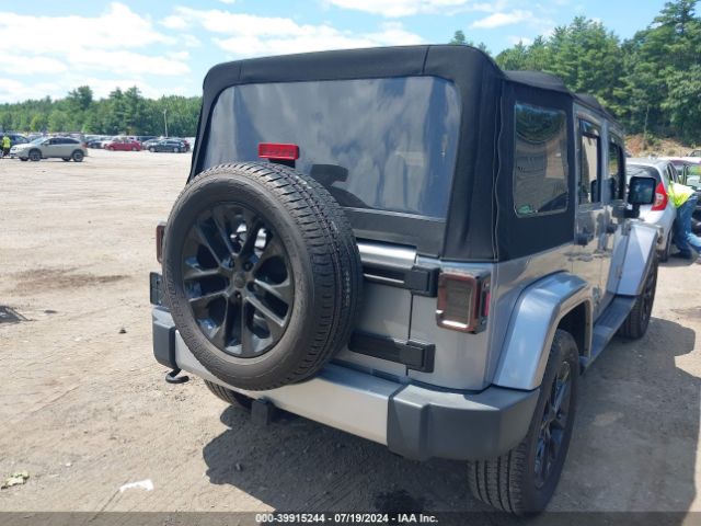 1C4BJWEG9FL704333 Jeep Wrangler Unlimited Sahara