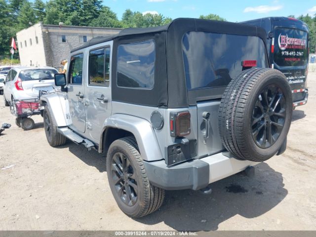 1C4BJWEG9FL704333 Jeep Wrangler Unlimited Sahara