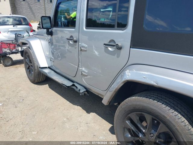 1C4BJWEG9FL704333 Jeep Wrangler Unlimited Sahara