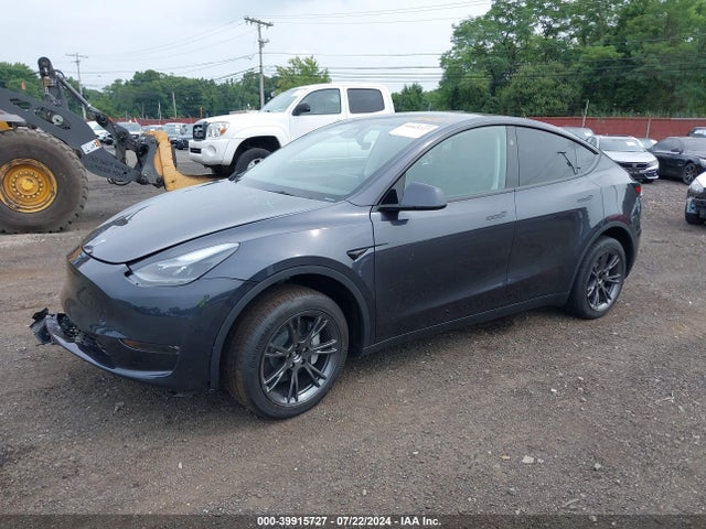 2024 TESLA MODEL Y 7SAYGDEE3RA300253 Photo 1
