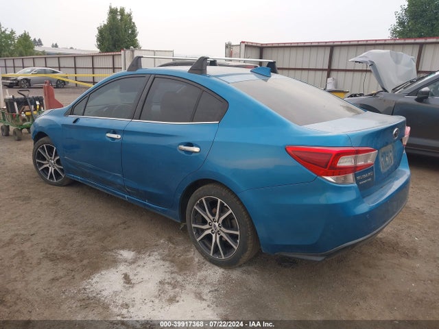 4S3GKAU69J3608354 Subaru Impreza 2.0i Limited