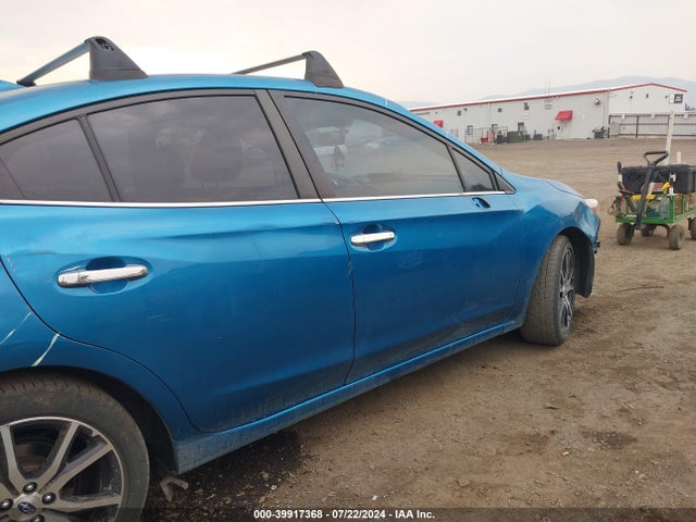 4S3GKAU69J3608354 Subaru Impreza 2.0i Limited