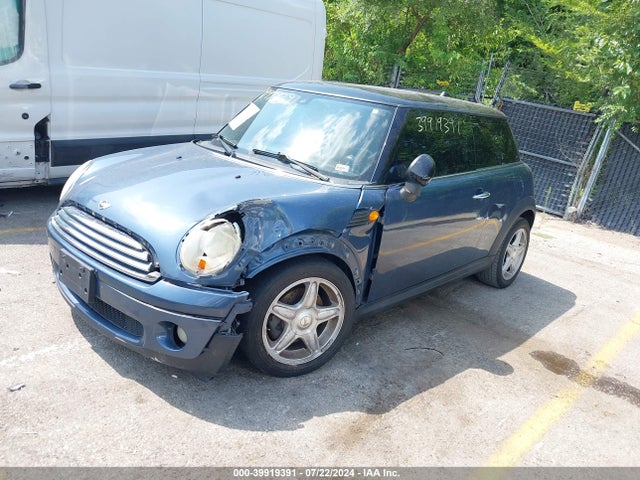 2009 MINI COOPER WMWMF335X9TU73566 Photo 1