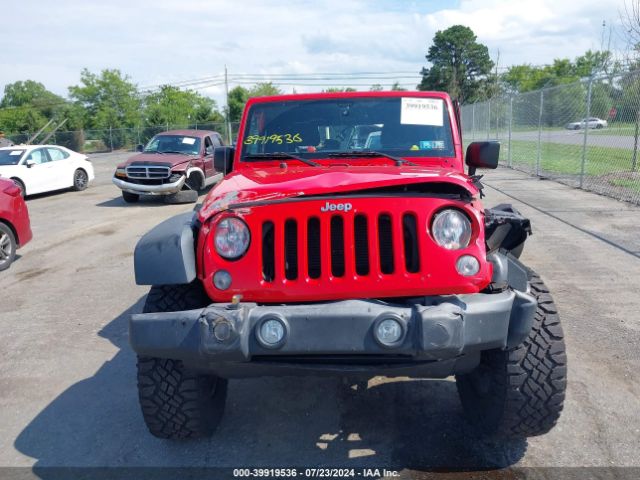 1C4AJWAG1GL200460 Jeep Wrangler Sport