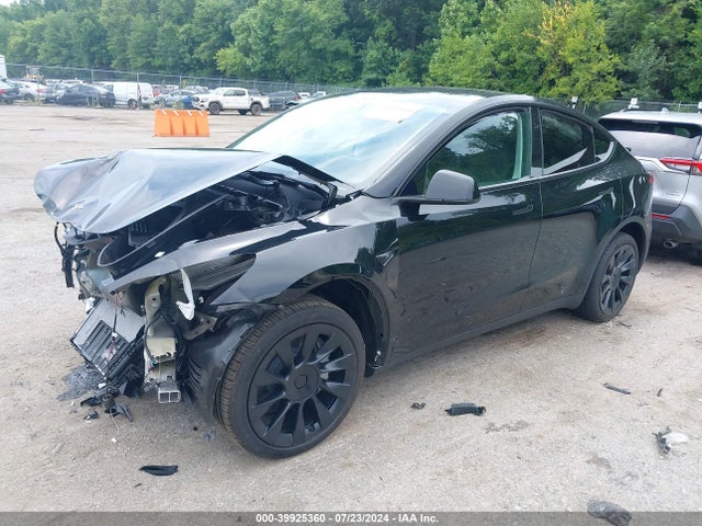 2024 TESLA MODEL Y 7SAYGDED1RF057360 Photo 1