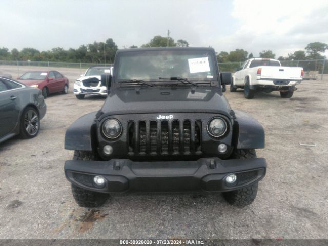 1C4BJWEG8EL304553 Jeep Wrangler Unlimited Sahara