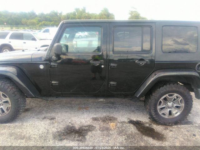 1C4BJWEG8EL304553 Jeep Wrangler Unlimited Sahara