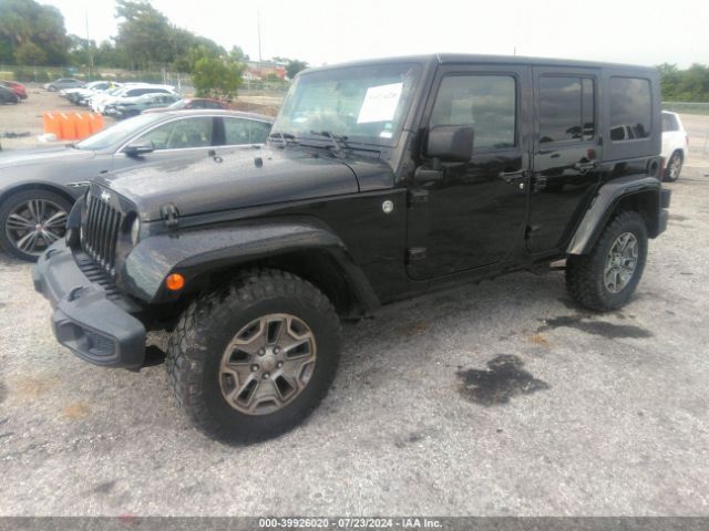 1C4BJWEG8EL304553 Jeep Wrangler Unlimited Sahara