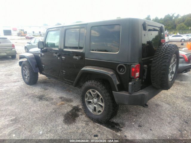 1C4BJWEG8EL304553 Jeep Wrangler Unlimited Sahara