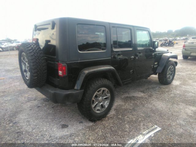 1C4BJWEG8EL304553 Jeep Wrangler Unlimited Sahara