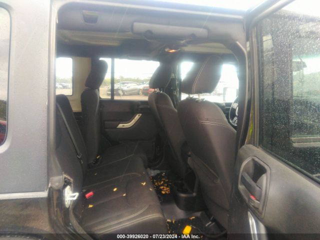 1C4BJWEG8EL304553 Jeep Wrangler Unlimited Sahara