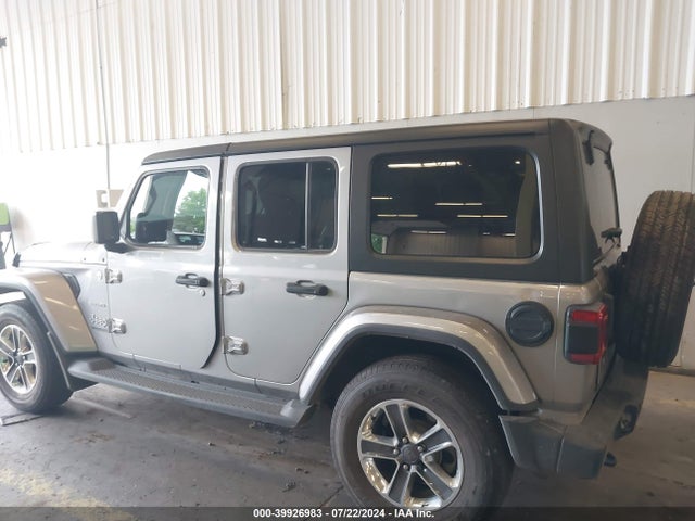 1C4HJXEGXJW106100 Jeep Wrangler Unlimited Sahara 4x4