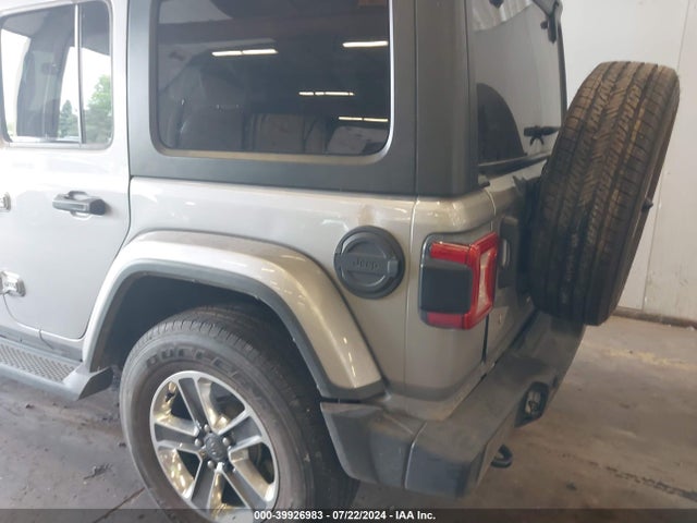 1C4HJXEGXJW106100 Jeep Wrangler Unlimited Sahara 4x4