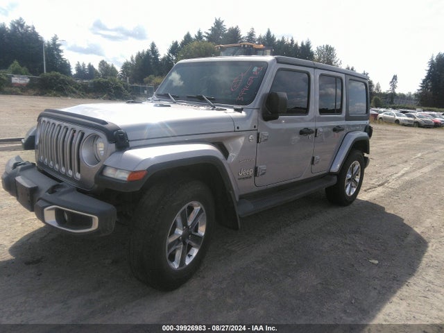 1C4HJXEGXJW106100 Jeep Wrangler Unlimited Sahara 4x4