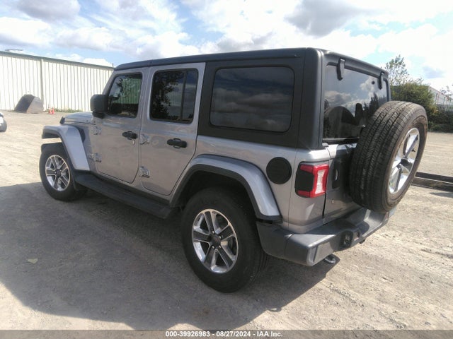 1C4HJXEGXJW106100 Jeep Wrangler Unlimited Sahara 4x4