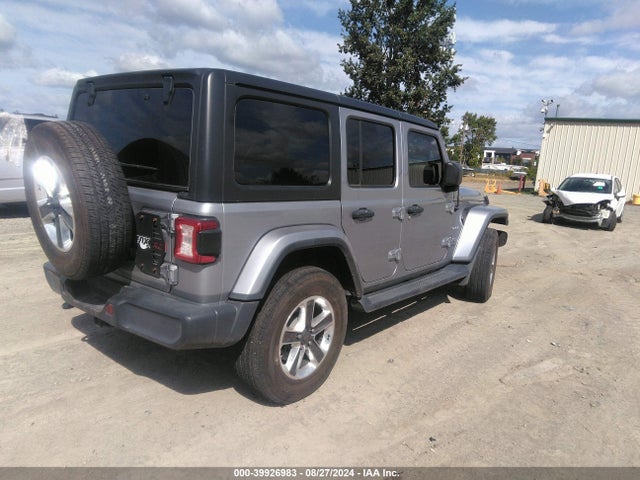 1C4HJXEGXJW106100 Jeep Wrangler Unlimited Sahara 4x4