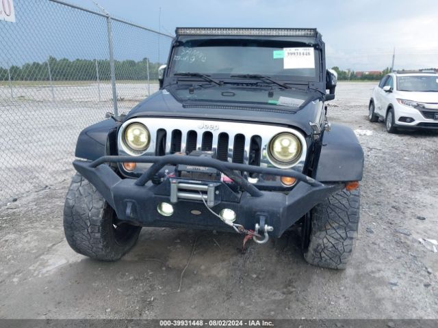 1C4BJWEG9FL578135 Jeep Wrangler Unlimited Sahara
