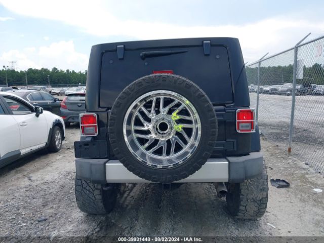 1C4BJWEG9FL578135 Jeep Wrangler Unlimited Sahara