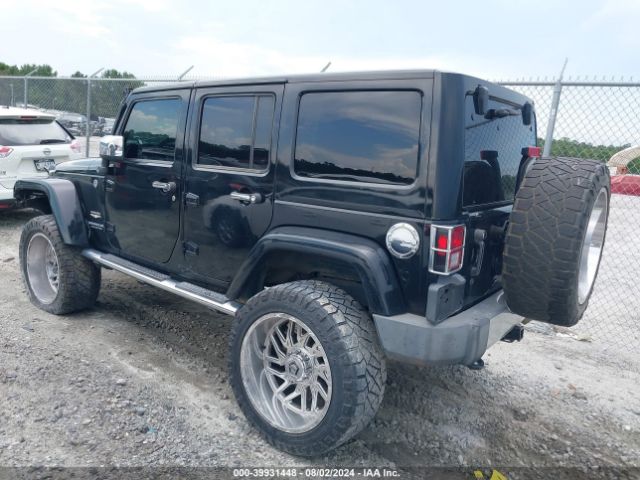 1C4BJWEG9FL578135 Jeep Wrangler Unlimited Sahara