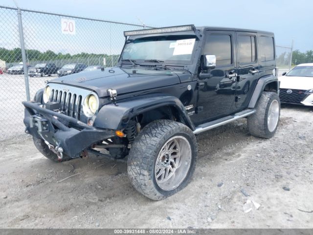 1C4BJWEG9FL578135 Jeep Wrangler Unlimited Sahara