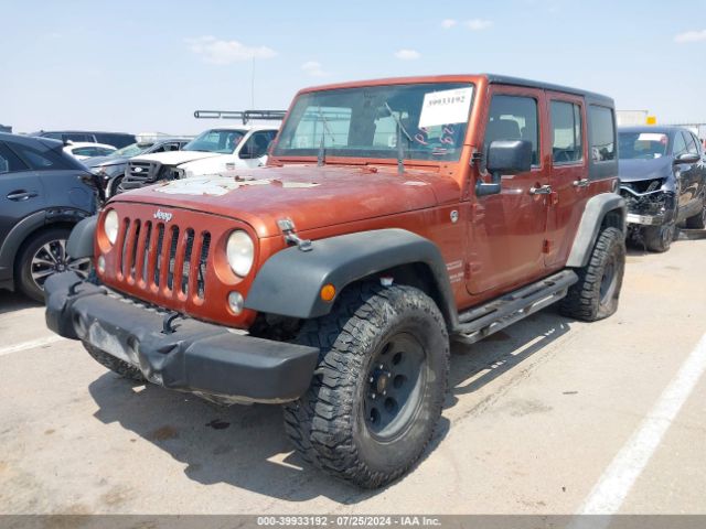 1C4BJWDG0EL216954 Jeep Wrangler Unlimited Sport